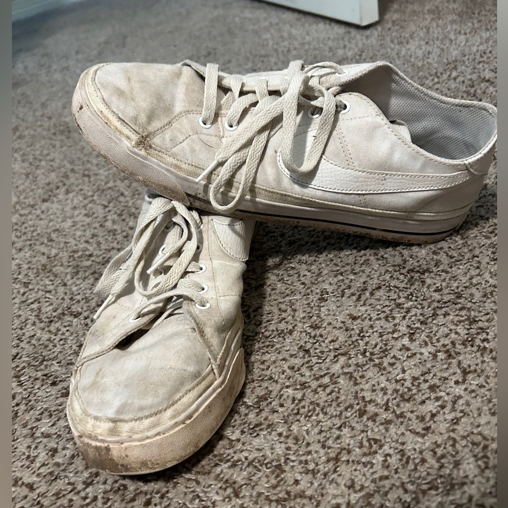 Casual Nike shoes. Size 11.5. White. Light staining, easy to clean